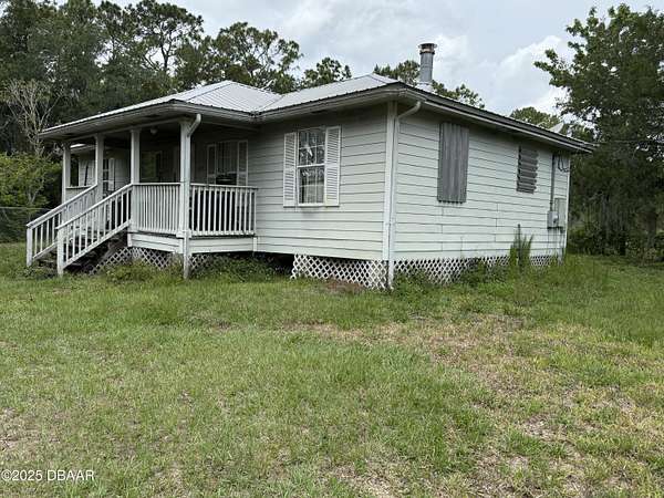 5 Acres of Residential Land with Home for Sale in New Smyrna Beach, Florida