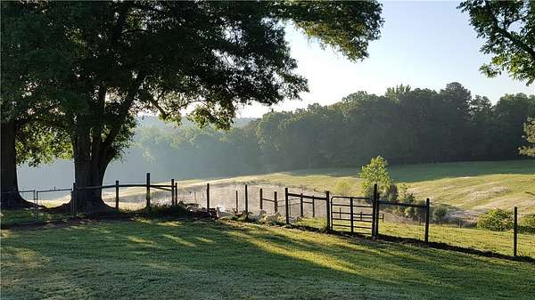 20.1 Acres of Land with Home for Sale in Hodges, South Carolina