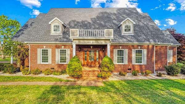 9.5 Acres of Land with Home for Sale in Murray, Kentucky