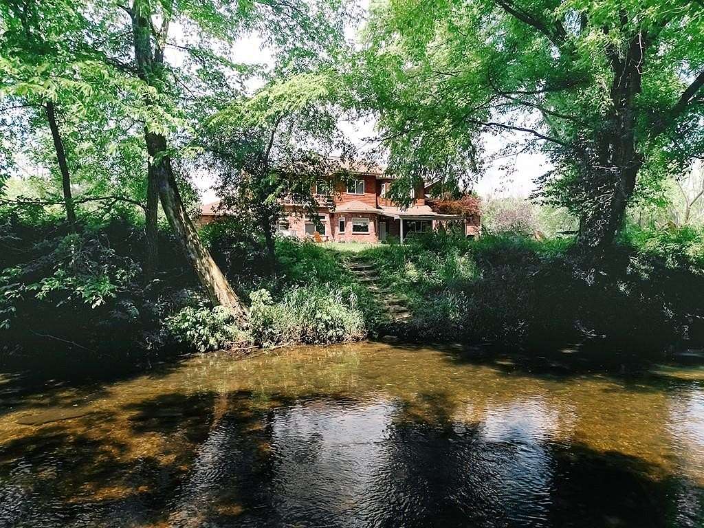 4.69 Acres of Residential Land with Home for Sale in Fayetteville, Arkansas