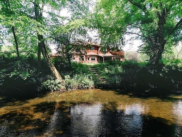 4.69 Acres of Residential Land with Home for Sale in Fayetteville, Arkansas