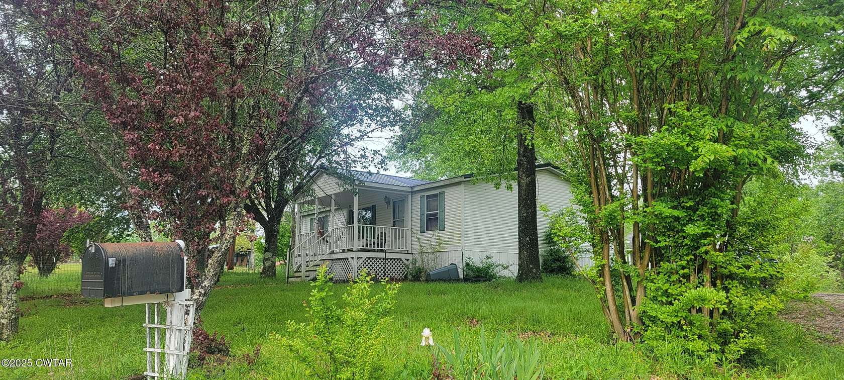 1.74 Acres of Residential Land with Home for Sale in Parsons, Tennessee