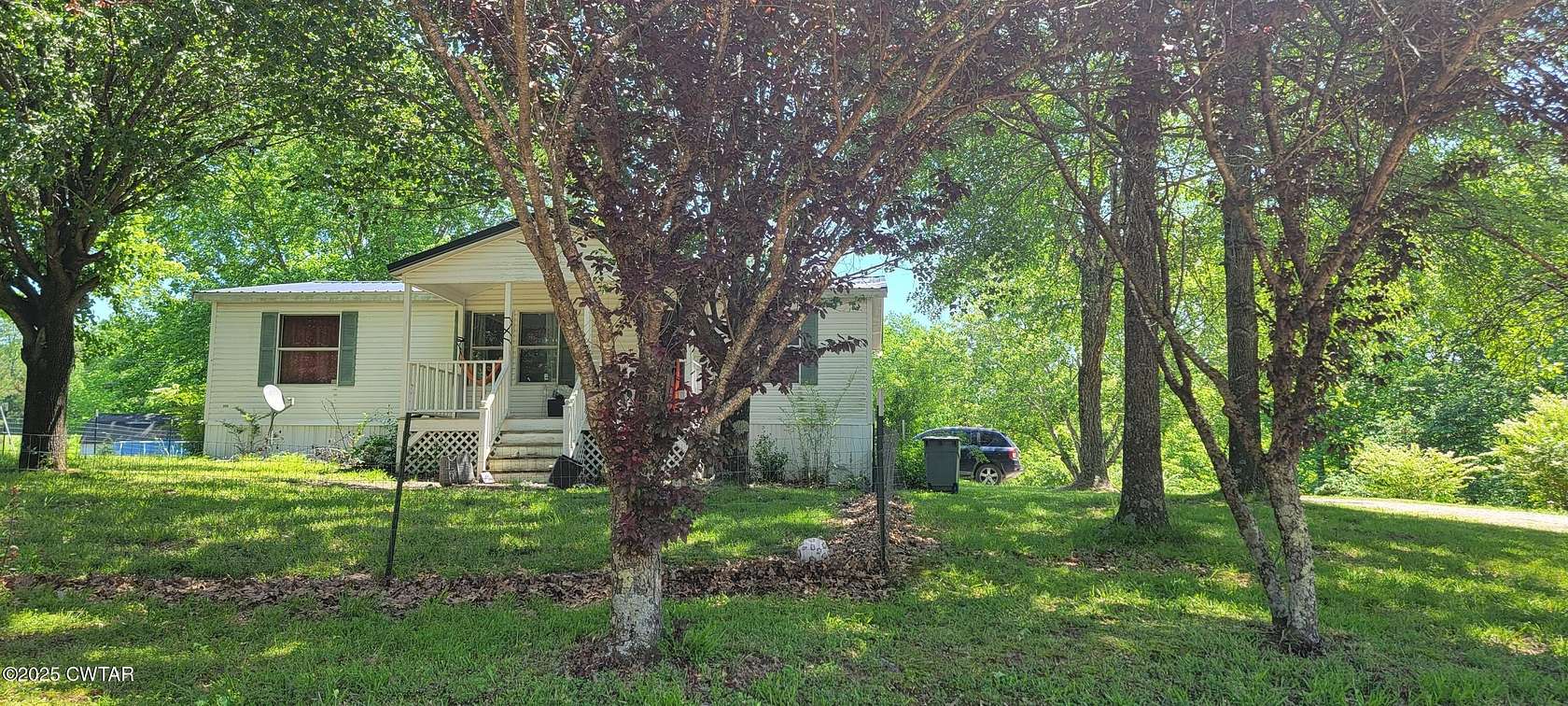 1.74 Acres of Land with Home for Sale in Parsons, Tennessee