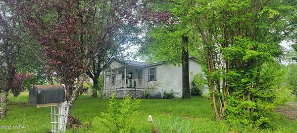 1.74 Acres of Residential Land with Home for Sale in Parsons, Tennessee