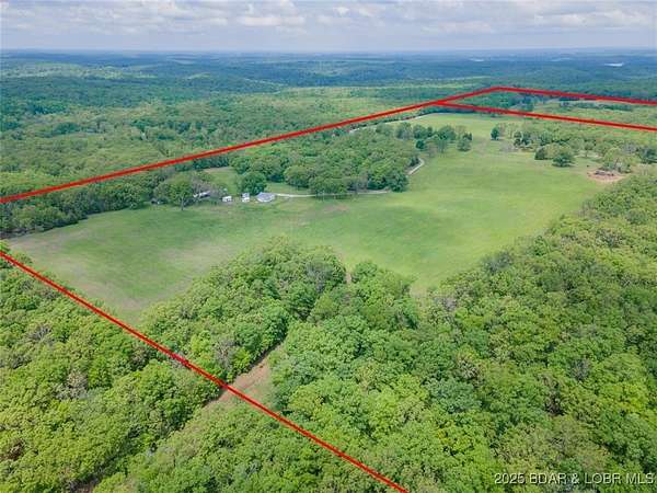 255 Acres of Land with Home for Sale in Linn Creek, Missouri