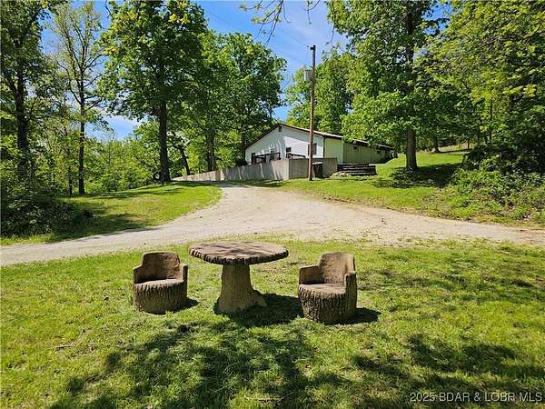 40.7 Acres of Land with Home for Sale in Versailles, Missouri