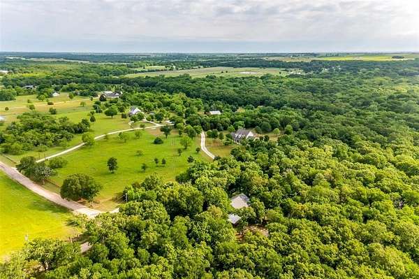 23.5 Acres of Land with Home for Sale in Covington, Texas