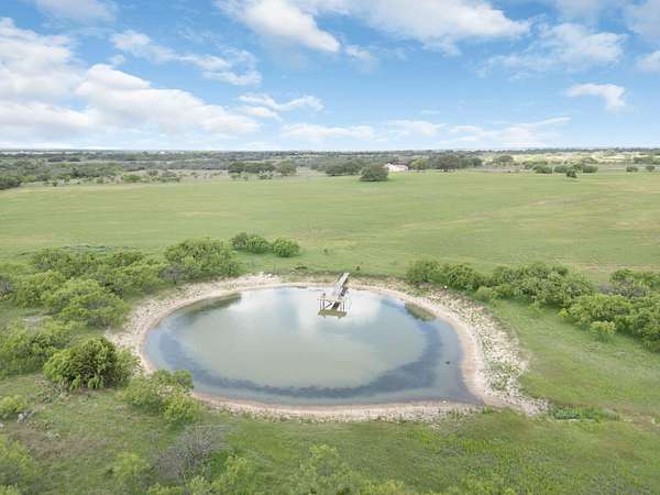 276 Acres of Land with Home for Sale in Mullin, Texas