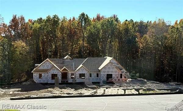 0.85 Acres of Mixed-Use Land for Sale in Milford, Michigan