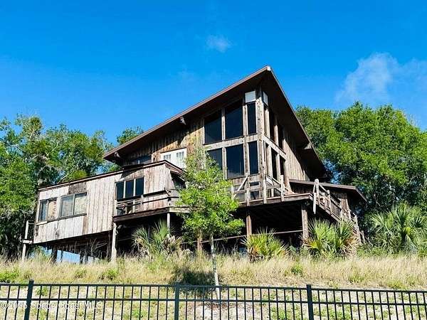 3.83 Acres of Residential Land with Home for Sale in Titusville, Florida