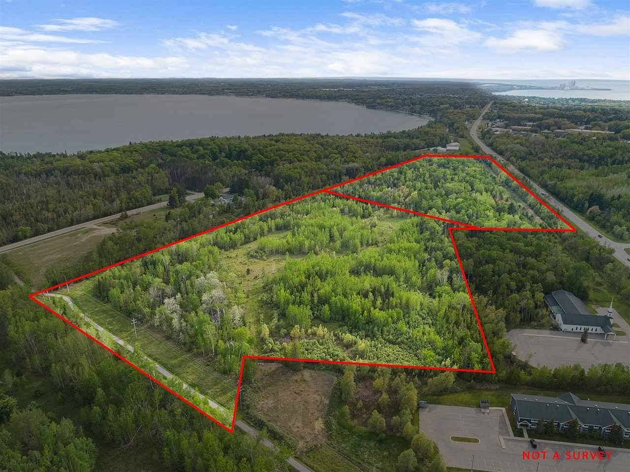 52 Acres of Mixed-Use Land for Sale in Charlevoix, Michigan