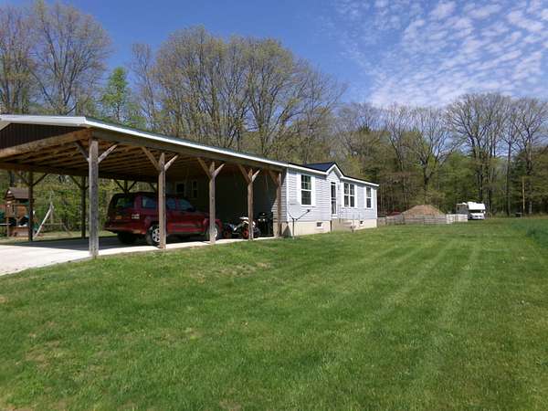 12 Acres of Land with Home for Sale in Constable, New York