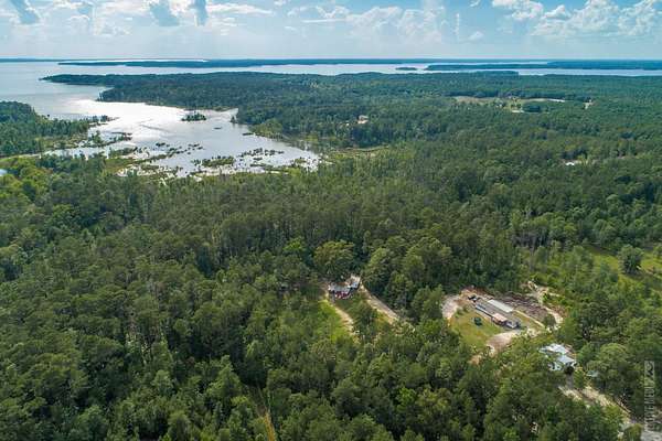 1.61 Acres of Residential Land with Home for Lease in Brookeland, Texas