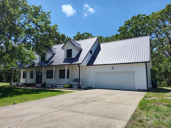 2.64 Acres of Residential Land with Home for Sale in Bolivar, Missouri