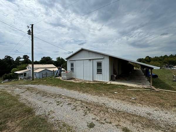 12.7 Acres of Land with Home for Sale in Hillsboro, Kentucky