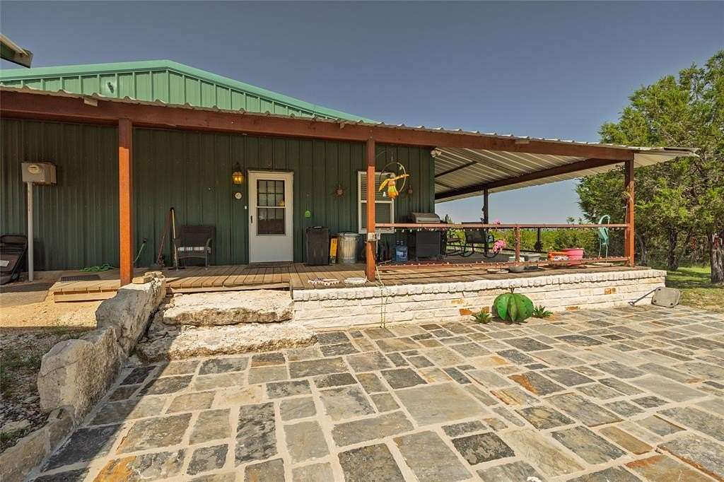 22.6 Acres of Agricultural Land with Home for Sale in Granbury, Texas