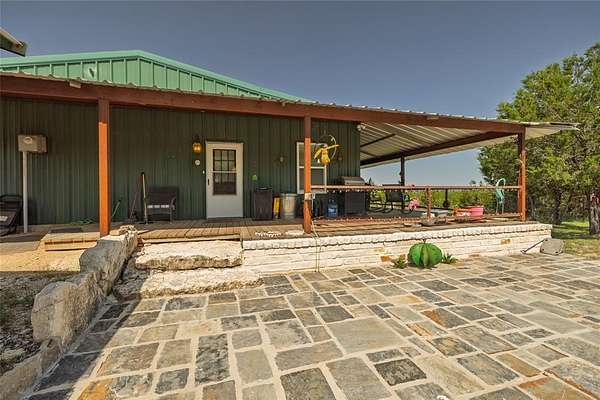 22.6 Acres of Agricultural Land with Home for Sale in Granbury, Texas