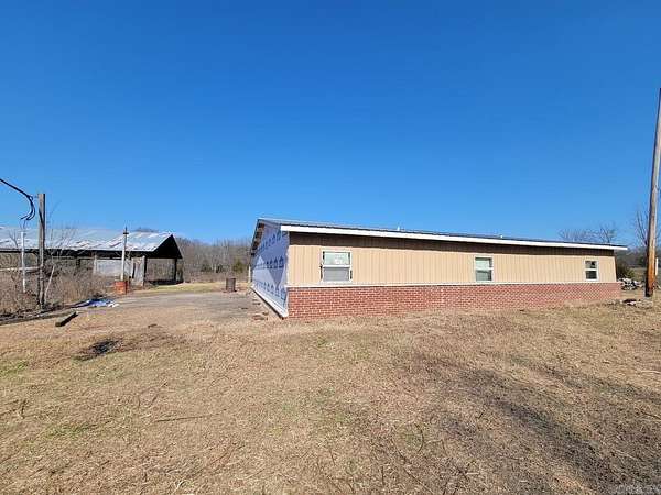 4 Acres of Residential Land with Home for Sale in Plainview, Arkansas