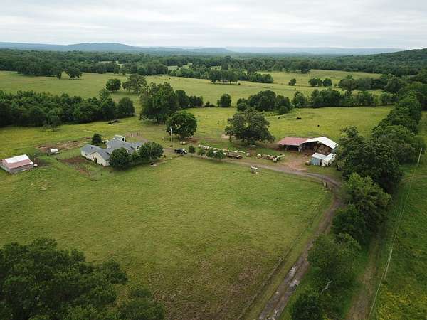82.3 Acres of Agricultural Land with Home for Sale in Dardanelle, Arkansas