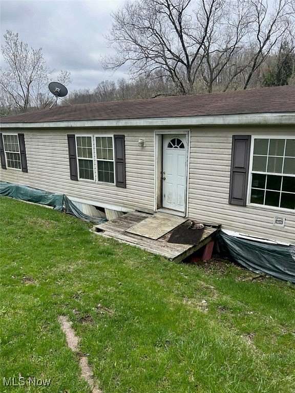 2.5 Acres of Residential Land with Home for Sale in Kimbolton, Ohio