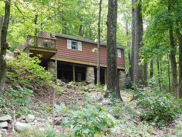 10.4 Acres of Land with Home for Sale in Orbisonia, Pennsylvania