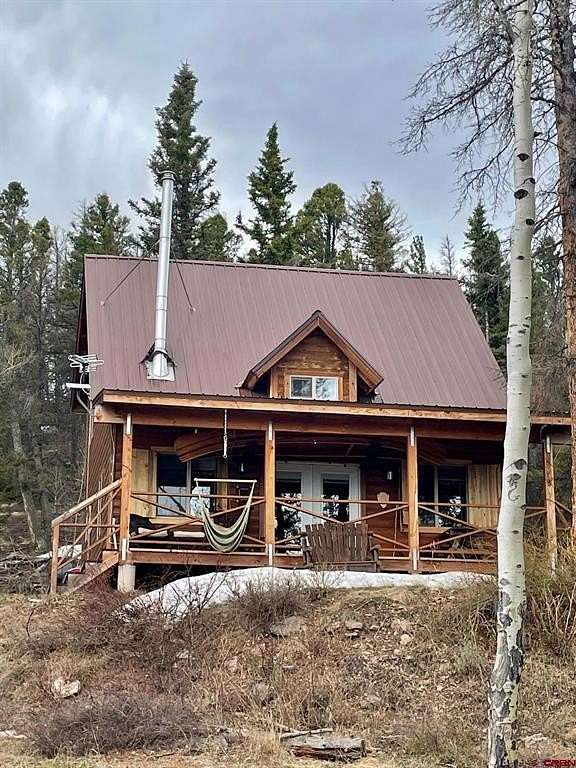 6.6 Acres of Residential Land with Home for Sale in Powderhorn, Colorado