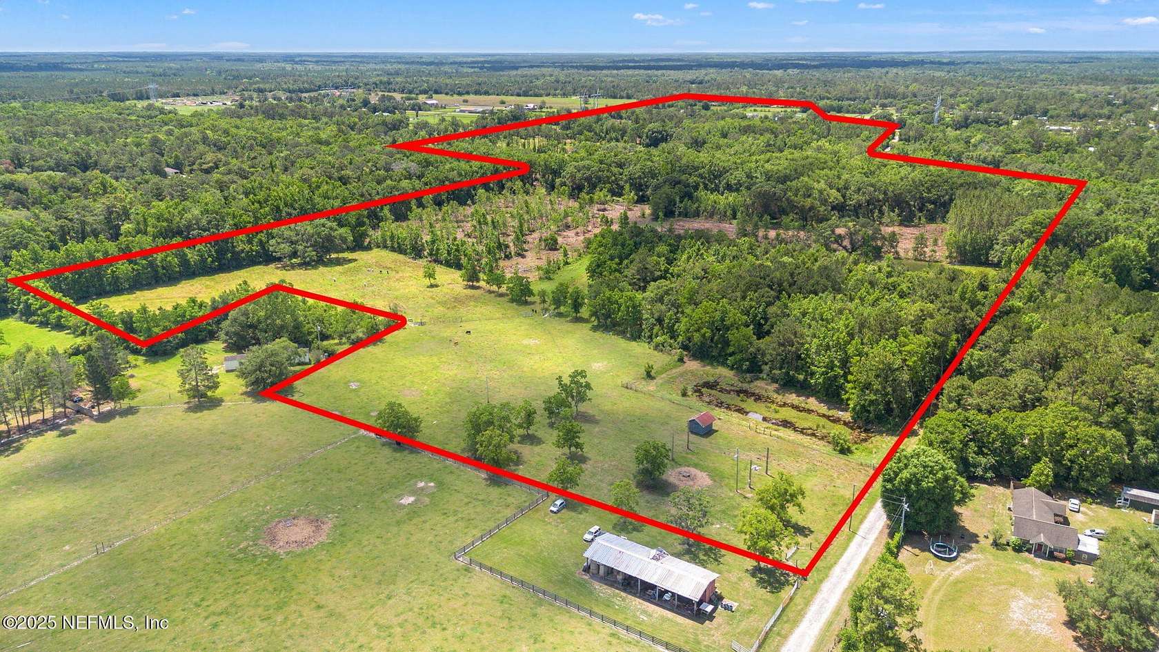 59.8 Acres of Agricultural Land with Home for Sale in Middleburg, Florida