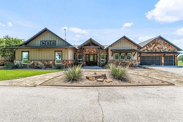 77.2 Acres of Agricultural Land with Home for Sale in Lipan, Texas