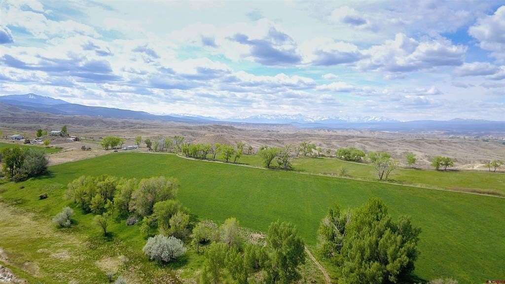 85.1 Acres of Agricultural Land with Home for Sale in Montrose, Colorado