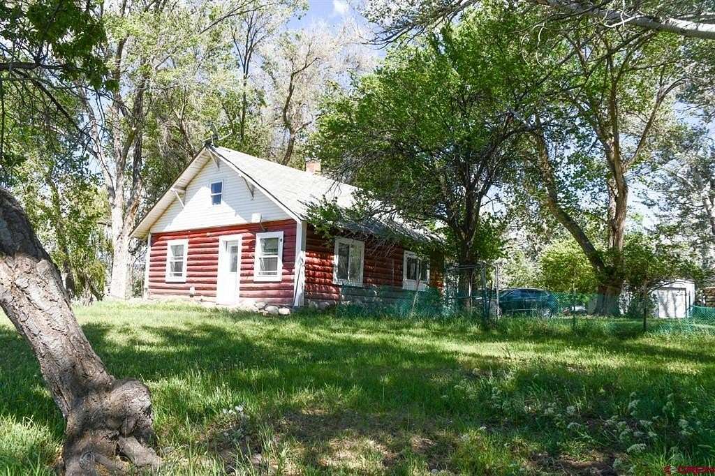 85.1 Acres of Agricultural Land with Home for Sale in Montrose, Colorado