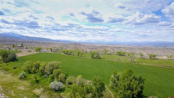 85.1 Acres of Agricultural Land with Home for Sale in Montrose, Colorado