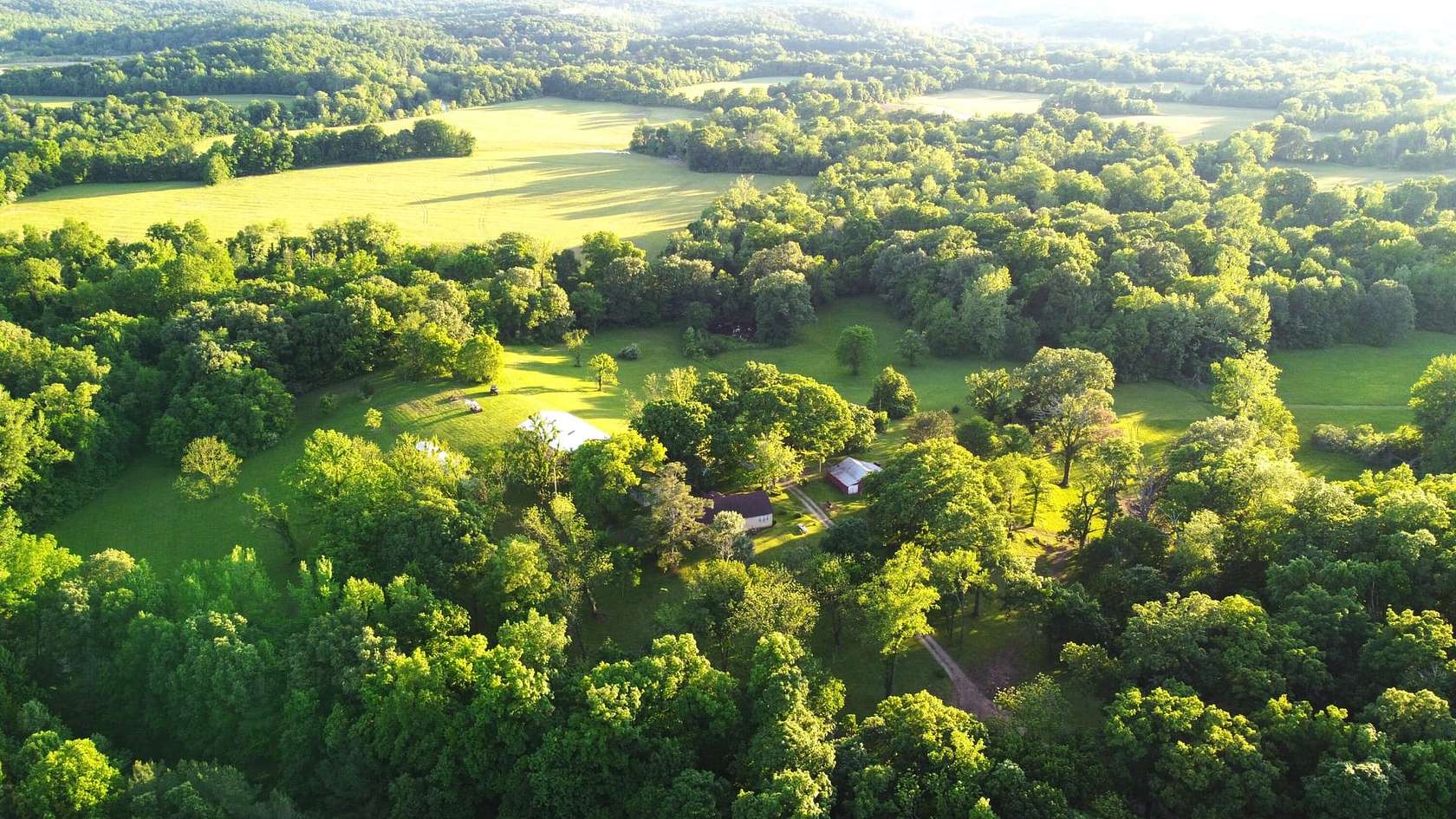 163 Acres of Land with Home for Sale in Poplar Bluff, Missouri