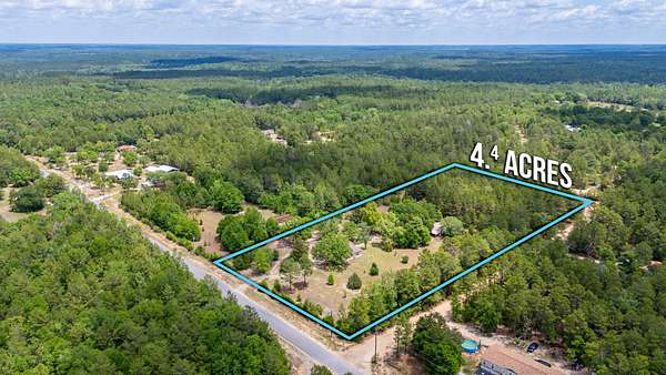 4.4 Acres of Residential Land with Home for Sale in Crestview, Florida
