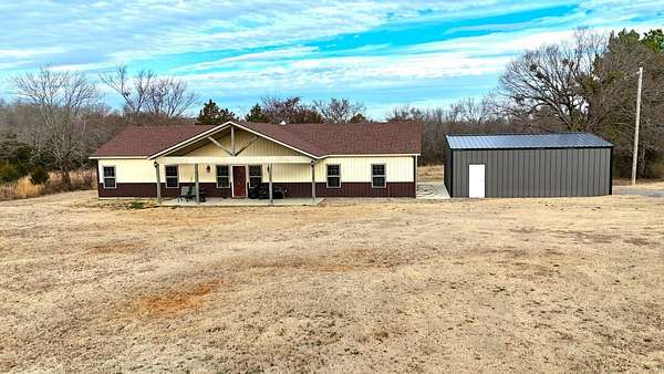 3 Acres of Residential Land with Home for Sale in Hartshorne, Oklahoma