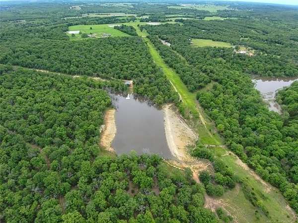 81.4 Acres of Recreational Land with Home for Sale in Stuart, Oklahoma