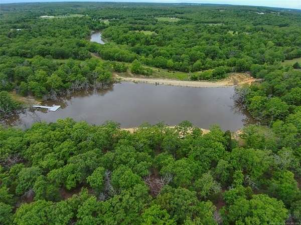 81.4 Acres of Recreational Land with Home for Sale in Stuart, Oklahoma