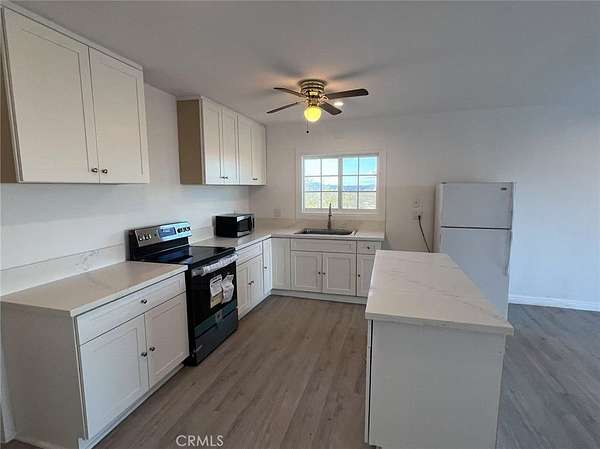 5 Acres of Residential Land with Home for Sale in Landers, California