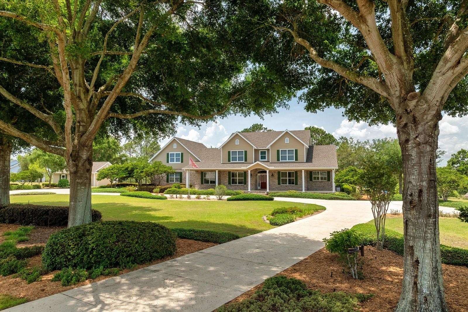 2.57 Acres of Residential Land with Home for Sale in Montverde, Florida