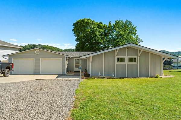 5 Acres of Land with Home for Sale in Dandridge, Tennessee