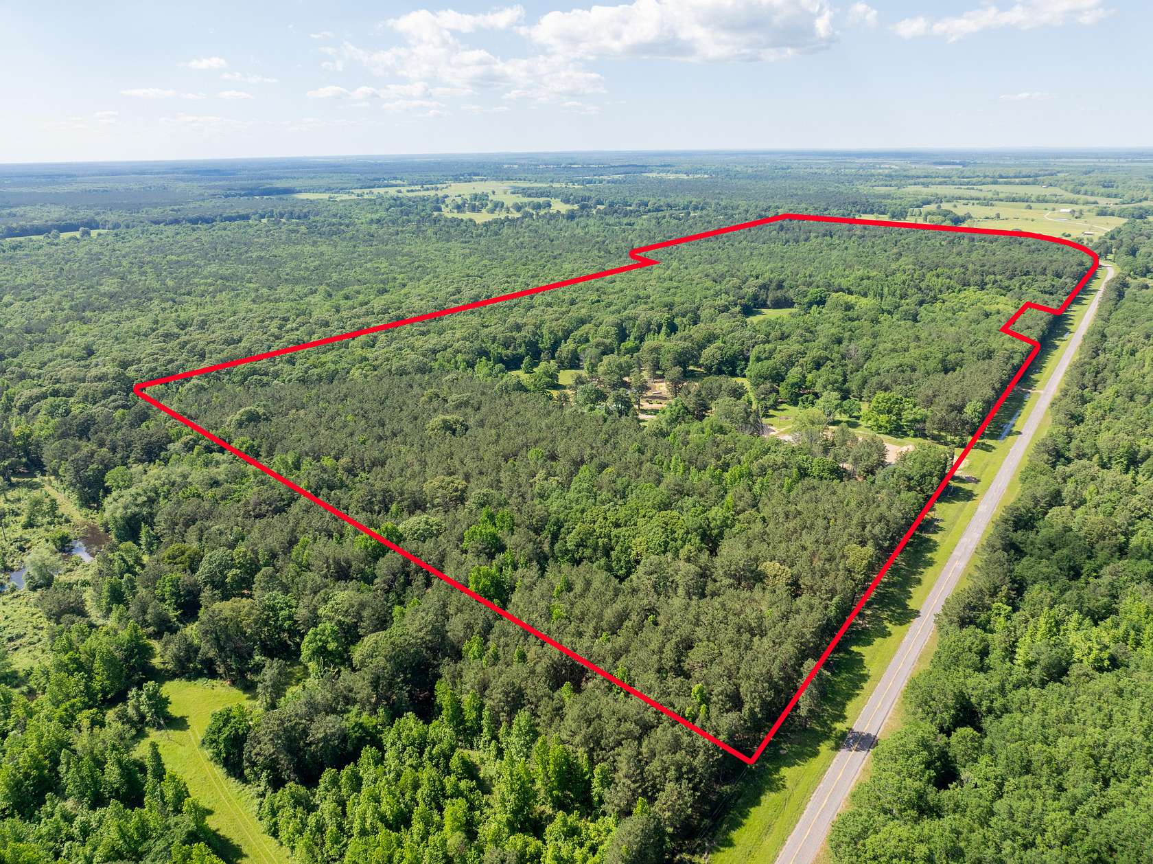 235 Acres of Land with Home for Sale in Clarksville, Texas