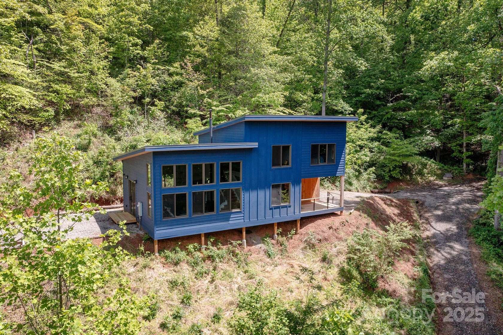 7.66 Acres of Residential Land with Home for Sale in Marshall, North Carolina