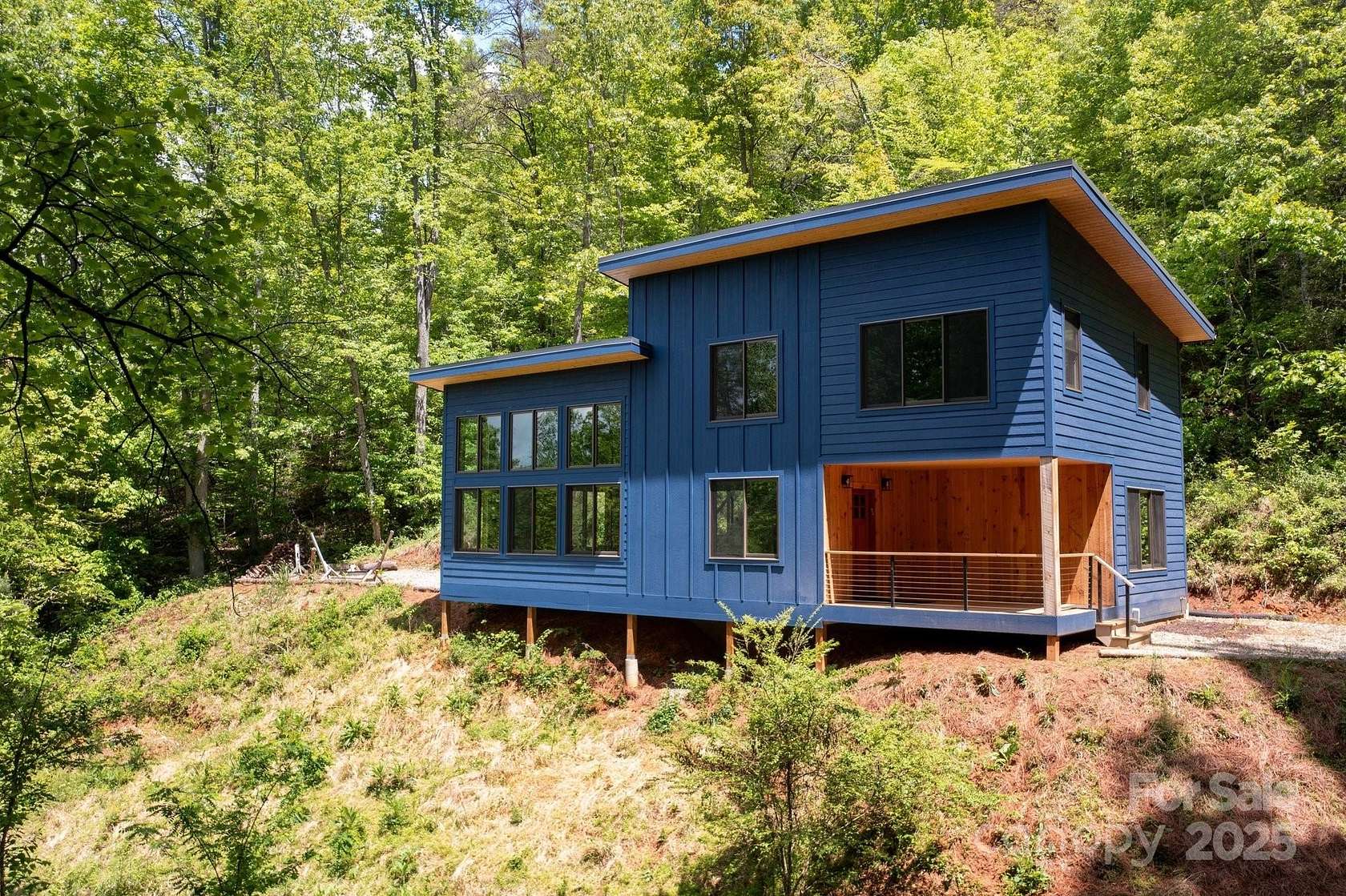 7.66 Acres of Residential Land with Home for Sale in Marshall, North Carolina