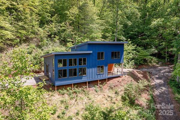 7.66 Acres of Residential Land with Home for Sale in Marshall, North Carolina