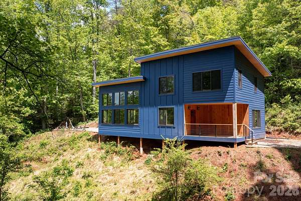 7.66 Acres of Residential Land with Home for Sale in Marshall, North Carolina