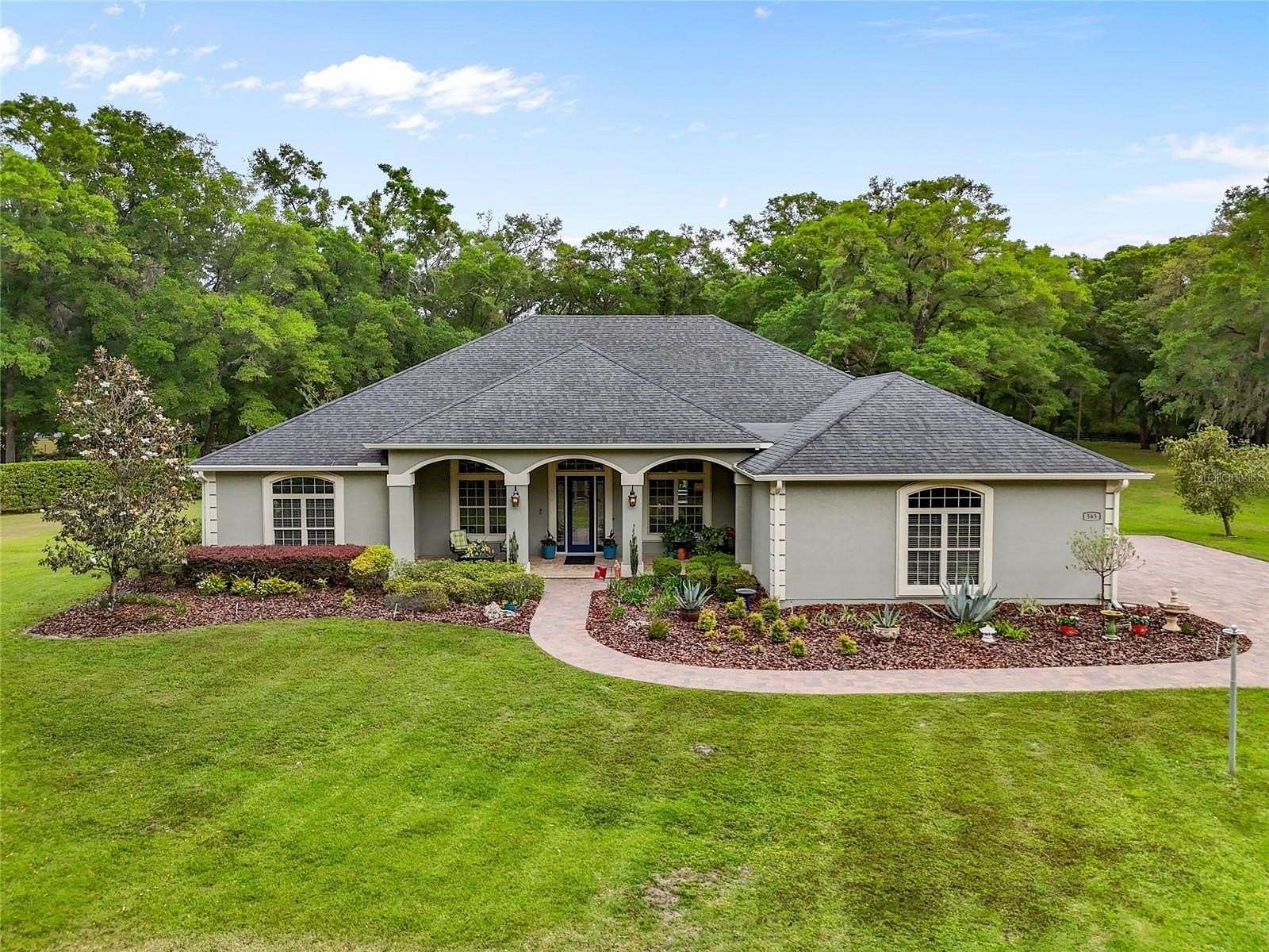 5 Acres of Residential Land with Home for Sale in Newberry, Florida