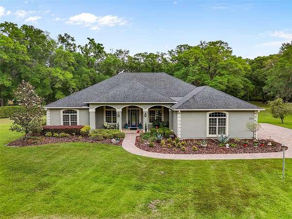 5 Acres of Residential Land with Home for Sale in Newberry, Florida