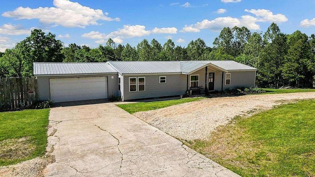 10 Acres of Improved Land for Sale in Pineville, Missouri