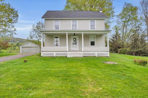 5.13 Acres of Land with Home for Sale in Fly Creek, New York