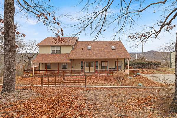 2.1 Acres of Residential Land with Home for Sale in Lampe, Missouri