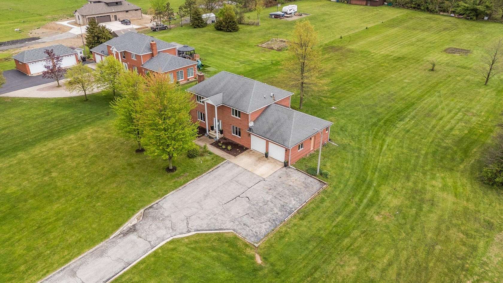 2.3 Acres of Residential Land with Home for Sale in Crown Point, Indiana